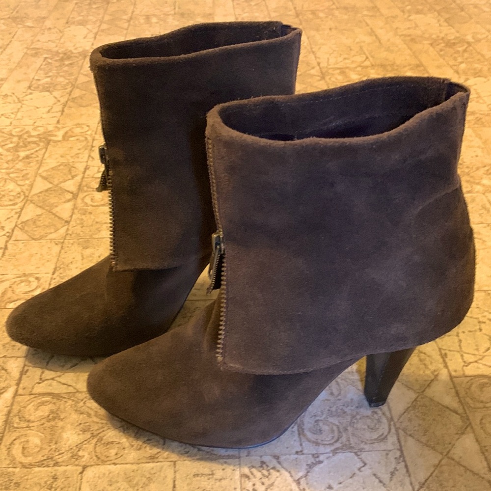 Suede chocolate brown bootie with zipper detail. Approximately 4”heels.